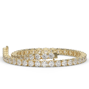 7 Carat Yellow Gold Round Shape Diamond Tennis Bracelet With Prong Setting.